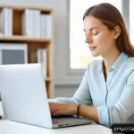 Home 21 일상 스트레스를 관리하는 방법 - A serene office scene showing a professional German woman in her 30s taking a mindful mini-break at ...